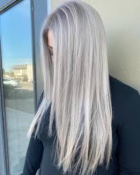 Add urban sophistication to your thick medium length hair with silver shades and tousled waves. Silver Blonde Hair How To Get This Trendy Color For 2021