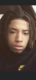 YOUNG MAN KILLED: Terrance Dunigan, 21, was shot to death in the 3300 block  of West Woodhill Lane, Peoria, IL