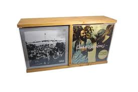 The play & display flip frame is the only display frame that allows music lovers to display their artwork and easily change the contents without removing with the resurgence of vinyl record sales, people are rediscovering their attachment to record cover art, both old and new. Holzpuristen Record Storage
