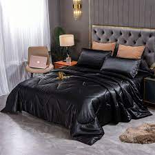 Comforters are soft covers that keep you snuggly and warm in bed, and are great decorative items for the most relaxing room in the house. Amazon Com Sisher Satin Silky Comforter Set Queen Black Bed Set 3pcs Luxury Comforter Quilt Bed Sets Lightweight Home Kitchen