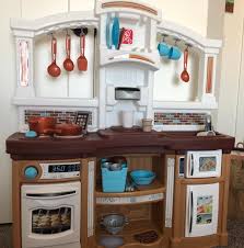 Features like the coffee maker station, realistic appliances with working doors, and included accessories make this play kitchen activity set ideal for pretend play fun! Step2 Fun With Friends Kitchen Tan Kitchen Play Set Walmart Com Walmart Com