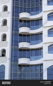 Polish architecture firm metaforma have designed an apartment in poznan, that features a palette of greys and wood to create a masculine appearance. Facade Modern Image Photo Free Trial Bigstock