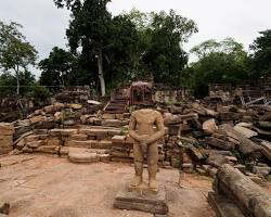The ancient, carved stone walls of Banteay Chhmar temple.