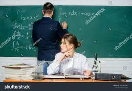Teaching In University University Education Knowledge Transfer Teacher And Student Near Chalkboard College Univers Education Teaching University University