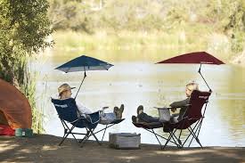 This Tricked Out Beach Chair Is The Only Place We Re Sitting This Summer In 2020 Camping Chairs Beach Chairs Beach Chair Umbrella