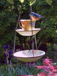 Combination Bird Bath And Feeder 41 Ways To Reuse Your Broken Things Bird Feeders Bird Houses Yard Art