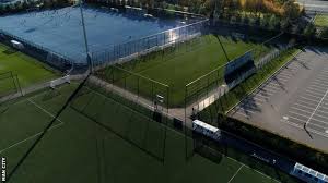 It's called the city of manchester stadium or sportcity but for sponsorship reasons it's referred to as the etihad stadium at least until 2021. Joe Hart Man City Name Training Pitch After Their Former Goalkeeper Bbc Sport