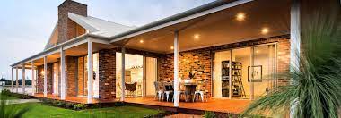 Red Brick Home Exterior With Wrap Around Veranda Driftwood I Dale Alcock Homes Country Home Exteriors Brick Farmhouse Brick Exterior House