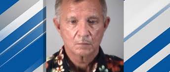 City manager charged with poking council member during fight