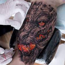 A breathtaking dragon inked on men with two paws. 101 Best Dragon Tattoos For Men Cool Design Ideas 2021 Guide