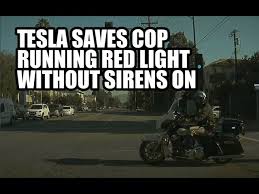 Watch This Tesla Save A Police Officer From An Accident