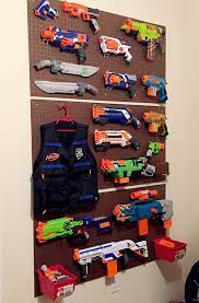 Nothing ruins a good nerf wall more than huge, uneven gaps between blasters. Hugedomains Com Kids Room Organization Boys Playroom Toy Rooms