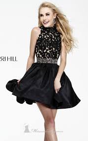 Feel The Magic Of Sherri Hill 21194 This Elegant Cocktail Dress Showcases A Sheer Lace With C Black Prom Dress Short Prom Dresses Short Elegant Cocktail Dress
