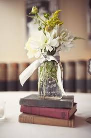 21 Centerpieces You Can Easily Diy Simple Centerpieces Diy Book Centerpieces Diy Centerpieces