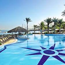 Choose Your Direction Wisely Amazing Pool Setting At The Hilton Abu Dhabi Outdoor Pool With Its Iconic Compass The Hiltonia B Beach Relax Resort Pools Pool