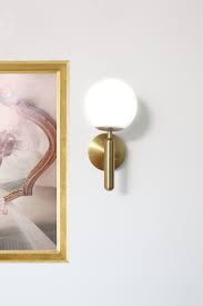 When it comes to spacing recessed lighting apart, industry standard is to divide the ceiling height in half and then use that number as your spacing guide. How To Install Wall Sconces Or Light Fixtures Without Hardwiring Or A Wall Outlet City Chic Decor