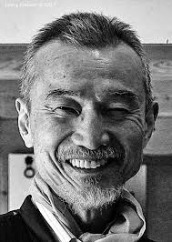 Satisfied Man Photographer unknown