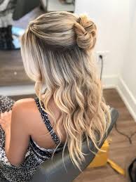 For an effortless look, let your locks flow free with soft waves or sleek straight strands. Half Up Half Down Bun With Waves Hairstyle By Goldplaited Prom Hairstyles For Long Hair Simple Prom Hair Ball Hairstyles