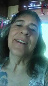 Me,today,and my self portrait of the blues after my husband passed away