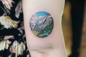 A mountain landscape tattoo looks best in flat and smooth areas of the body. Tattoo Landscape Arm Maiko Only