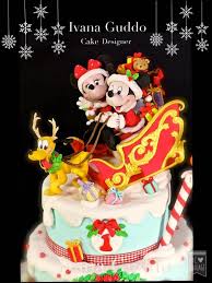 Santa mickey is standing on one side and a christmas tree. Mickey Mouse And Minnie Christmas Cake Cake By Ivana Cakesdecor