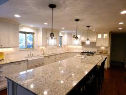 A grey and white granite with spots of black. Granite White Ice Countertops Salt Lake West Jordan Pleasant Grove Layton St George
