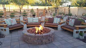 Cinder Block Fire Pit There Is Always A Good Reason To Build A Fire Pit In Your Backyard And When It Co Backyard Seating Area Backyard Seating Cozy Backyard
