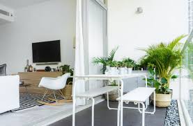 A Polished Condo In Singapore With Carefully Considered Clutter Condo Balcony Home Decor Outdoor Dining Area