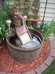 15 Smart Ways To Incorporate Wooden Barrels In Your Yard The Art In Life Water Fountains Outdoor Diy Water Fountain Fountains Outdoor