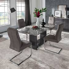 Modern dining tables brings you today 10 modern and glamorous marble dining tables and gives you some decor tips on how to embrace this luxurious material in your dining room design. Rina Grey Marble Dining Table Set Modern Marble Fads