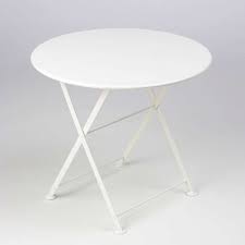 Solid walnut top and reclaimed peroba frame. Fermob Tom Pouce Table