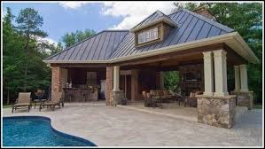 This pool cabana is a simple four post design with a thatched roof and elevated flooring for lounging or sitting. Backyard Landscaping Origins Of Japanese Landscape Design Diy Landscape Backyard Pool House Designs Pool Houses Pool House Plans