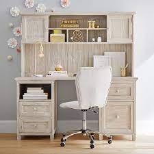 A desk with a hutch and drawers, shelves or cabinets will allow you to neatly stash away your computer accessories, files and supplies out of sight. Beadboard Smart Storage Hutch Desk Pottery Barn Teen