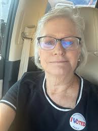 This is my dil. She asked me to ask you if you could please work your magic  and place her in Christmas themes. Please delete the sunglasses & glasses  if any. Thank