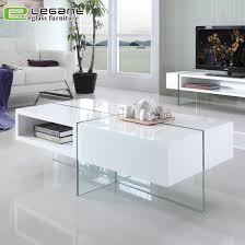 Consider one with an unexpected silhouette. China Living Room Wooden White High Gloss Mdf Drawer Glass Coffee Table China Coffee Table Glass Coffee Table