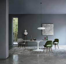 The undercarriage of chairs and tables in a typical interior makes an ugly, confusing, unrestful world. Stock Saarinen Tulip Dining Table Oval 198cm Couch Potato Company