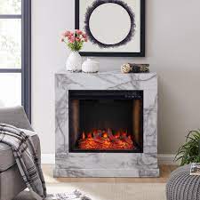 Mantels direct offers a collection of high quality, hand carved, imported marble fireplaces, marble fireplace surrounds, and marble mantels. Southern Enterprises Barsdale Alexa Enabled 33 25 In Faux Marble Electric Smart Fireplace In White Hd014098 The Home Depot
