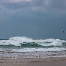 Surfer S Parachute In A Stormy Sky Over The Foamy Waves Of The Mediterranean Sea Waves Mediterranean Sea Surfer