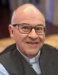 Obituary information for Rev. Dr. Robert Roland LaRochelle