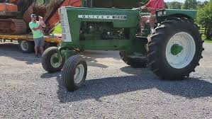 Image result for Gray 1965 Tractor
