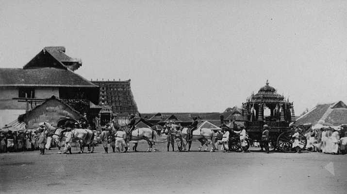 Photograph taken about 1900 by the Government photographer, Zacharias D'Cruz of the Travancore Maharaja's State Carriage in Trivandrum. It was drawn by a team of six horses. In the background can be