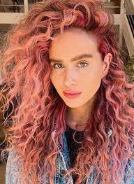 Soft pastel pink hair color looks great on this blunt bob hairstyle, this is perfect for girls with light to medium skin tones. Amazing Peachy Pink Long Curly Hairstyles For Women In 2020 Curly Pink Hair Curly Hair Styles Hair Styles