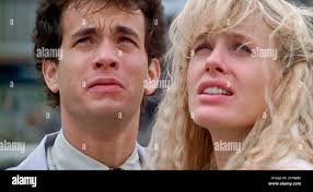 USA. Tom Hanks and Daryl Hannah in a scene from ©Buena Vista Pictures film:  Splash (1984). Plot: A young man is reunited with a mermaid who saved him  from drowning as a