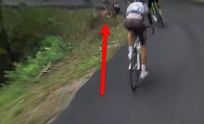 Stage one of the tour de france on saturday saw two big crashes take down several riders, one of which was caused when a spectator stuck out a sign too far into the road. Video Scary Crash Takes Out Tour De France Contender Richie Porte
