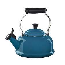 Le Creuset Classic Whistling Tea Kettle Is Now Available In A New Color Deep Teal Kettle Le Creuset Tea Kettle Enameled Cast Iron Cookware