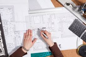 Close Up Of Architect Desk With Blueprints Architects Desk Interior Design Renderings Architecture Jobs