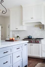 Nive Color Combo Off White Kitchen With Blue Grey Island Off White Kitchen With Blue Grey Island White Kitchen Tiles Off White Kitchens Blue Kitchen Cabinets