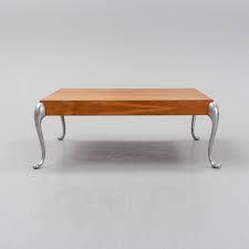 This coffee table features scalloped genuine marble top and queen anne legs made with a cherry finish.this traditional style coffee table is perfect for any home decor. A Cherry Wood Coffee Table By Morten Voss Designed 1994 Bukowskis