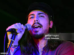 John Turrell, lead vocalist with Smoove & Turrell performs