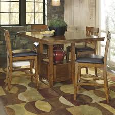 Signature Design By Ashley Ralene D594 42 4x124 Casual Dining Table Set With 4 Bar Stools Furniture Fair North Carolina Pub Table And Stool Sets